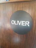 round black and silver plaque